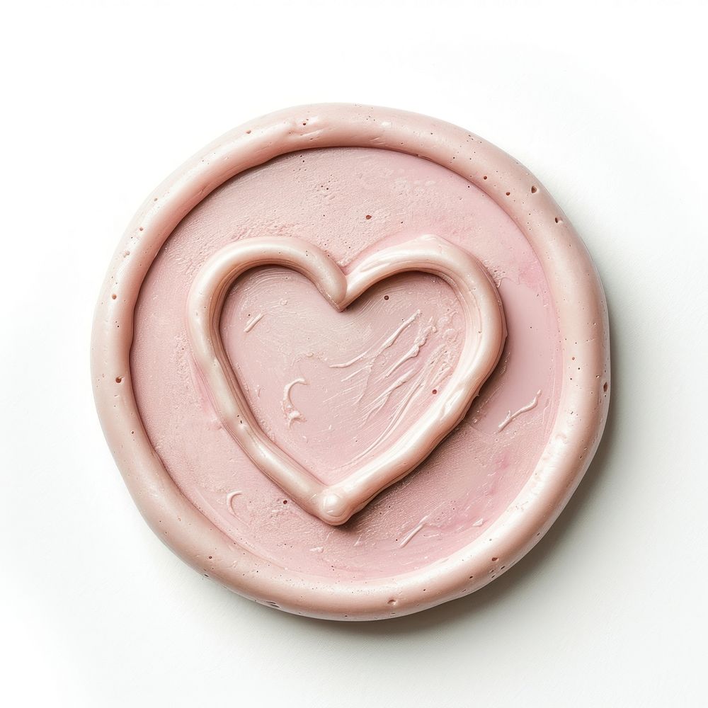 Seal Wax Stamp of a pastel heart dessert white background dishware.