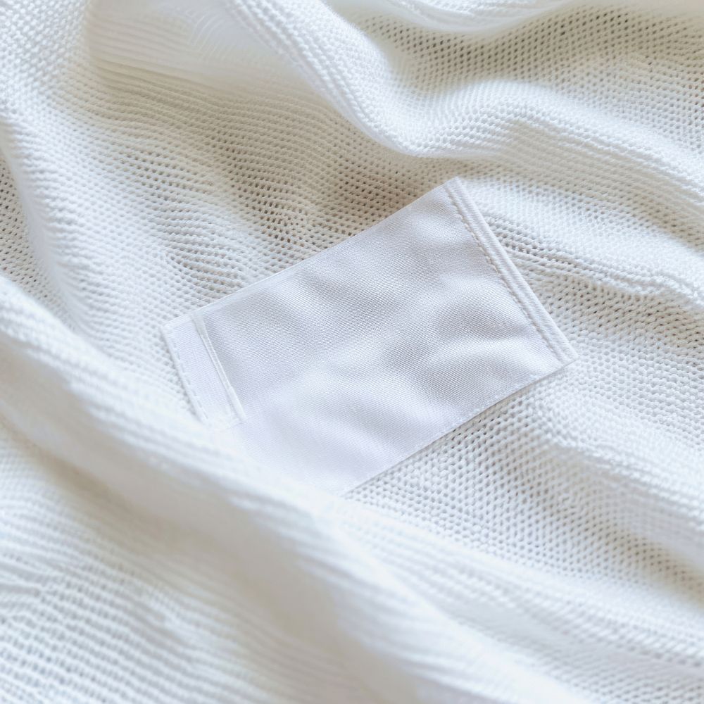 Blank white clothes label backgrounds material crumpled.