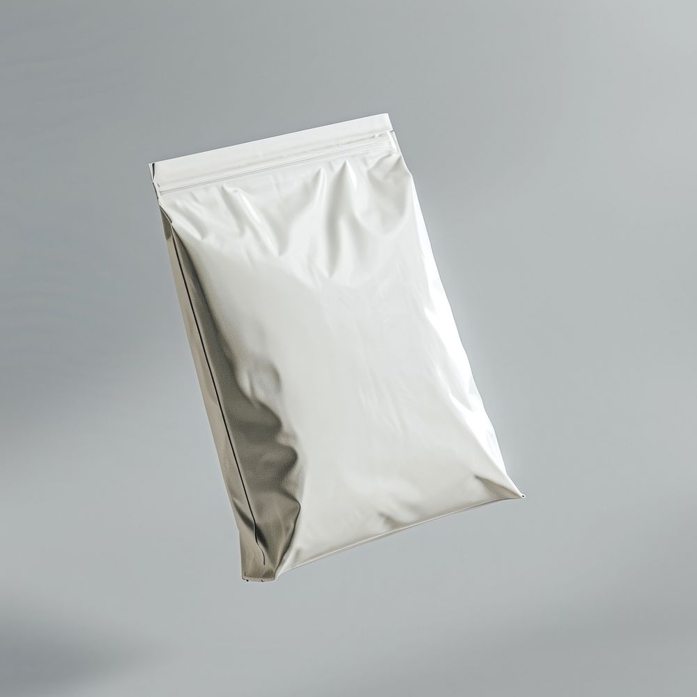 Blank mailing bag  gray gray background aluminium.