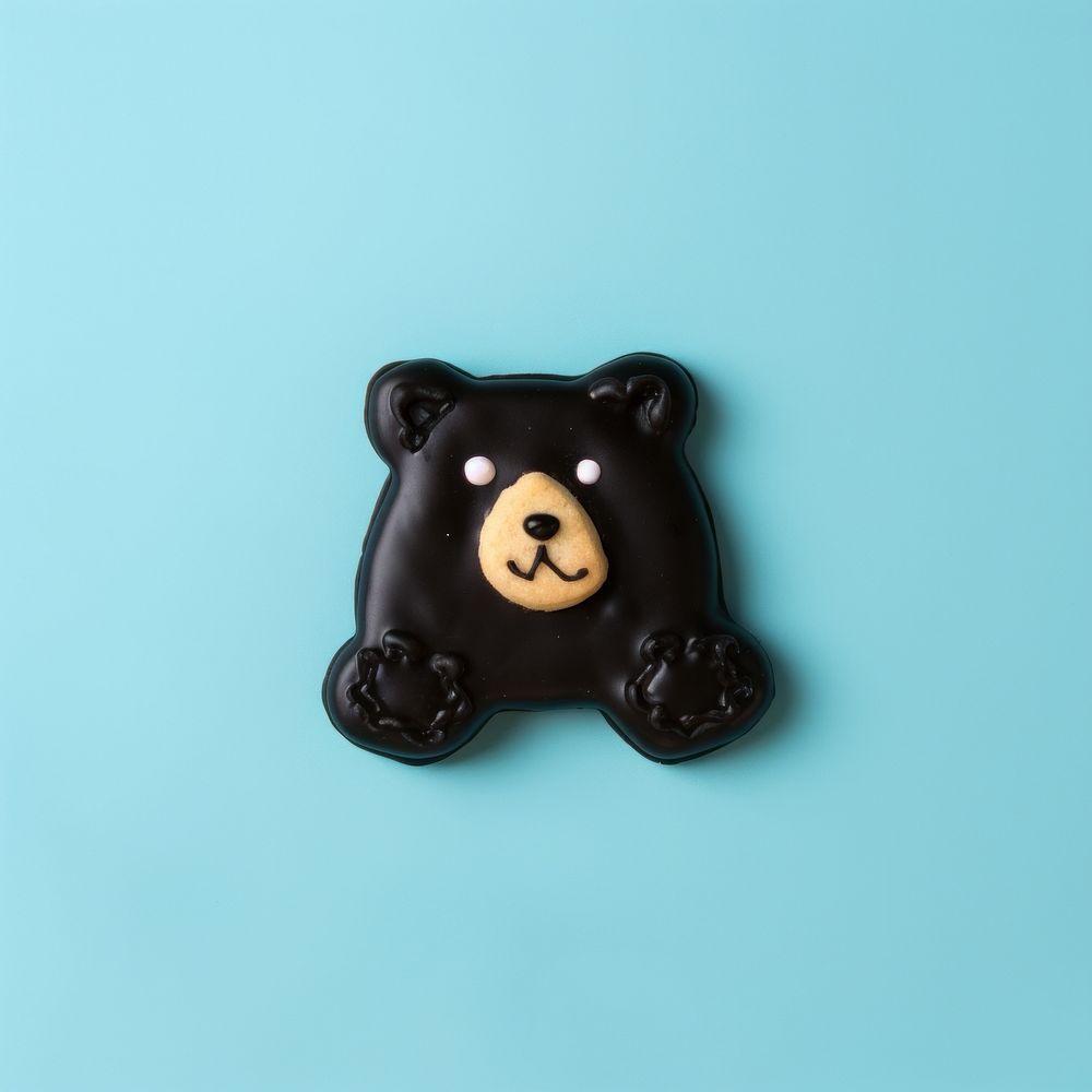 Black bear dessert cookie icing. AI generated Image by rawpixel.