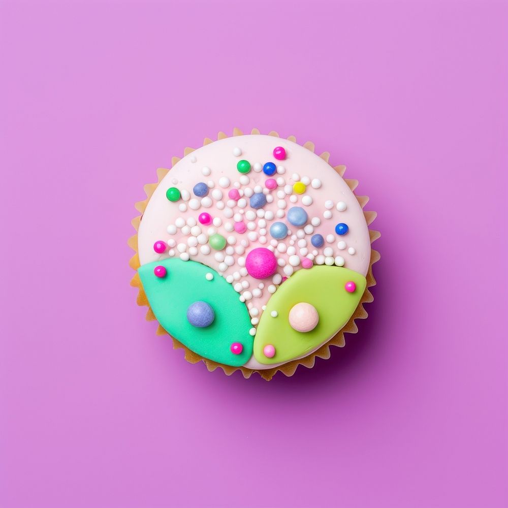 Cup cake icing sprinkles dessert. AI generated Image by rawpixel.
