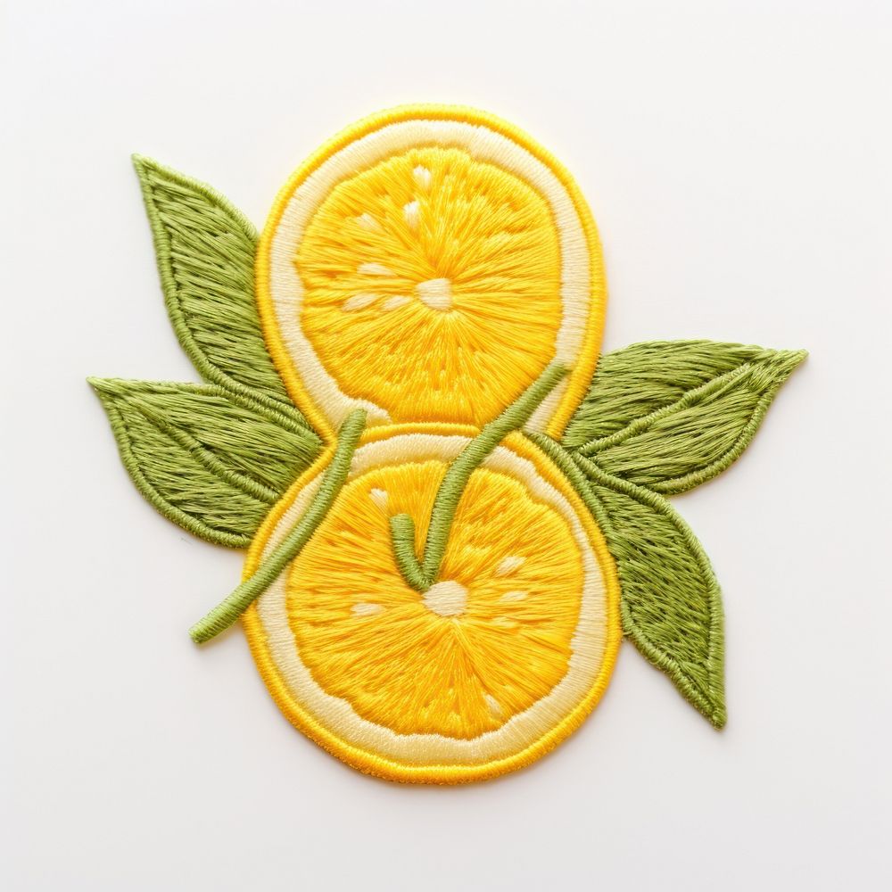 The lemon in embroidery style textile fruit plant.