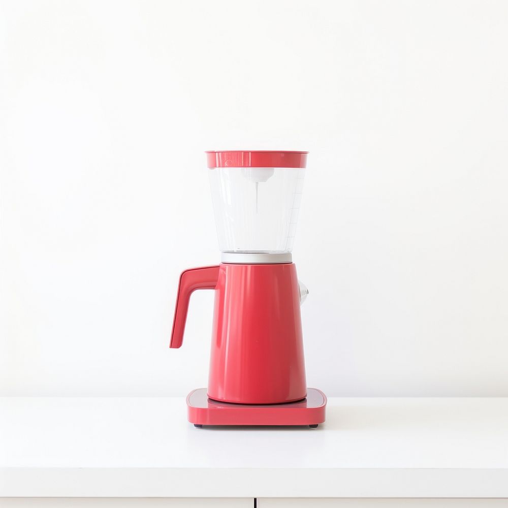 A minimal red coffee maker appliance blender mixer.