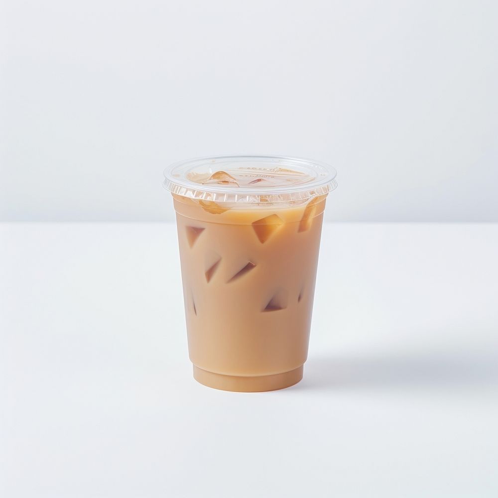 A plastic disposable ice caramel macchiato coffee glass drink juice cup.