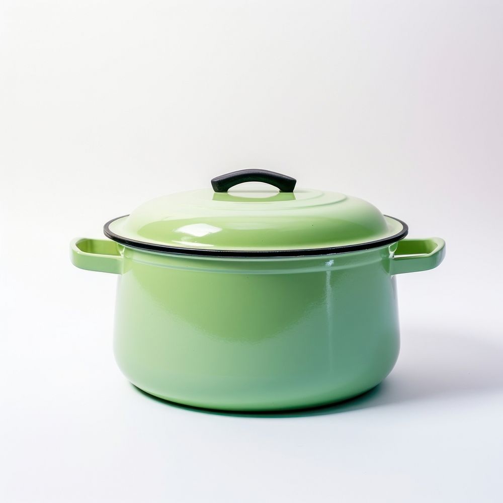 A retro green dutch oven pot appliance cookware white background.