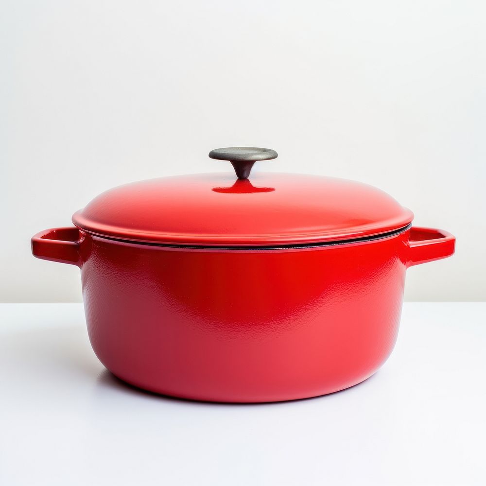 A retro red dutch oven pot cookware white background appliance.
