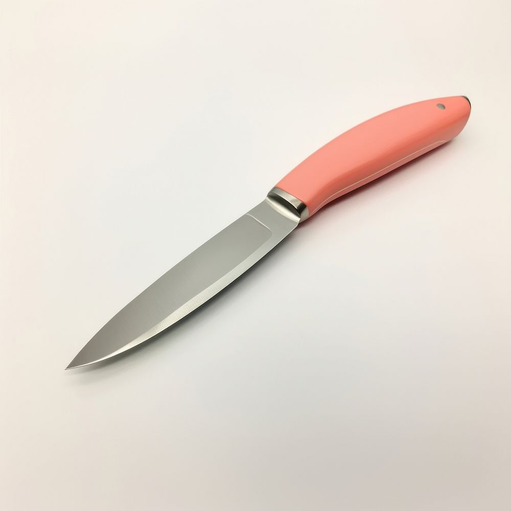 Salmon color ceramic knife weapon dagger blade.