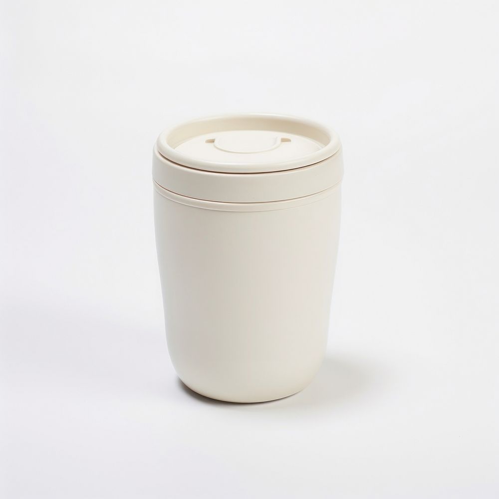 A white insulated tumbler with lid porcelain milk cup.