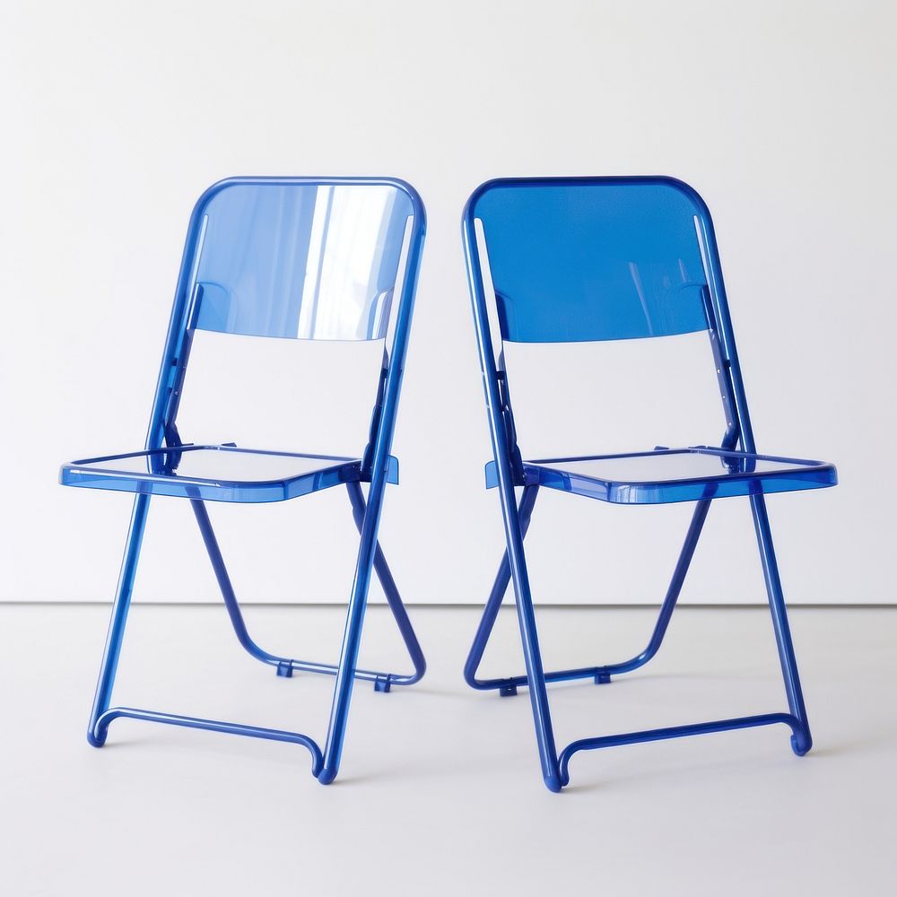 Blue acrylic folding chairs furniture white background armrest.