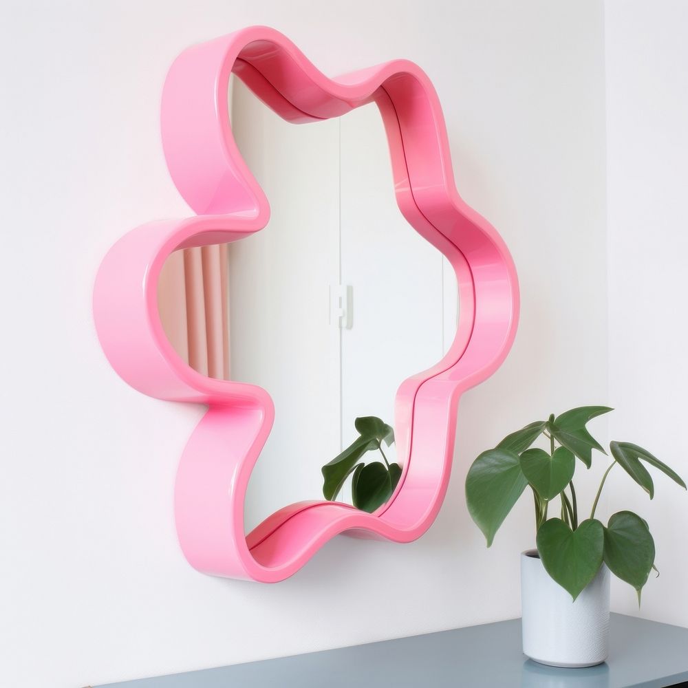Pink squiggle mirror for wall architecture sideboard indoors.