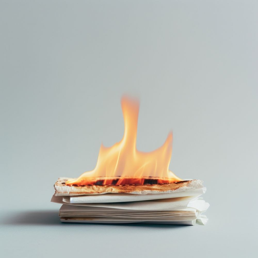 Photography of a Small Burning stack of paper fire fireplace burning.