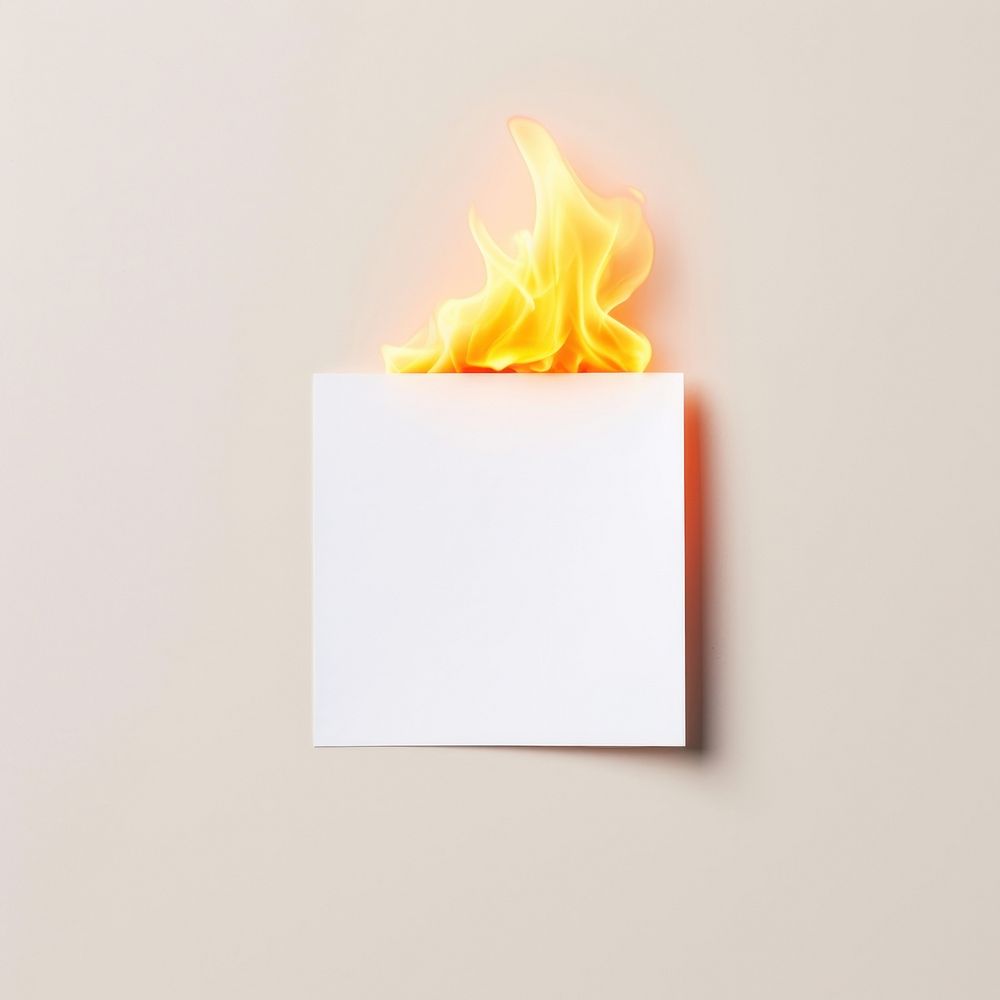Photography of an little Burning white card fire burning flame.