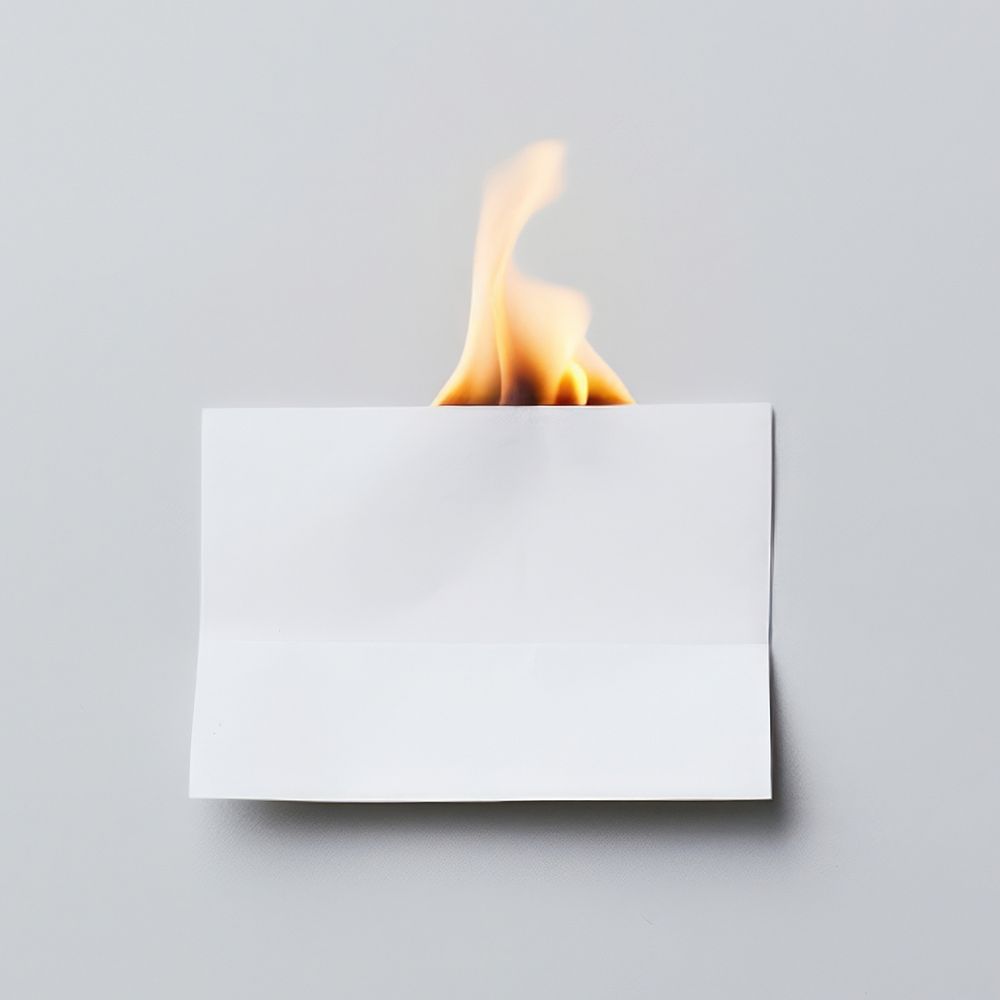 Aesthetic photo of a small Burning bank paper fire burning flame.