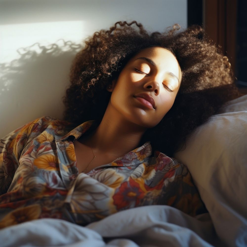 A mixed race american-african woman sleeping bedroom adult.