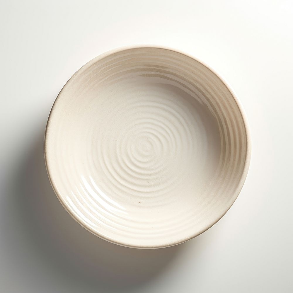A minimal off-white dish porcelain pottery plate.
