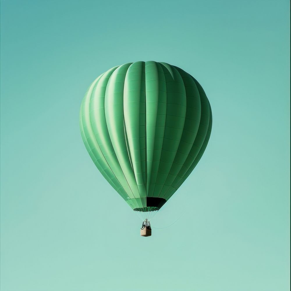 Green hot air balloon aircraft vehicle transportation.