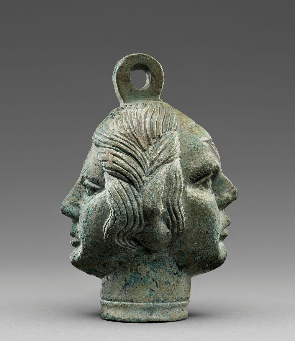 Weight with Heads of a Maenad and a Satyr