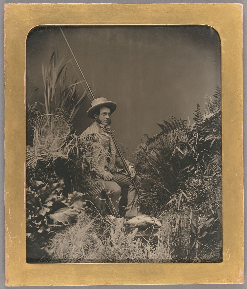 Studio Portrait of a Man Posed with Fishing Gear / The Fisherman