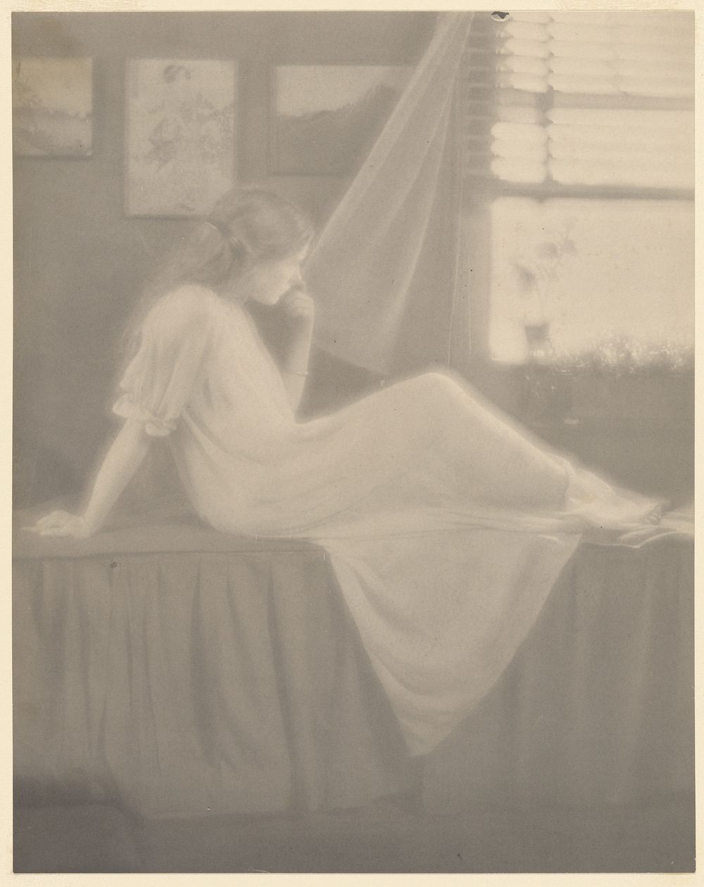Potrait of a Woman Seated on a Bed Gazing Out a Window by Paul B Haviland