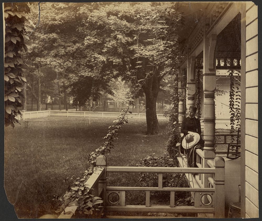 Young woman on porch railing, Maple City by Edward H Hart