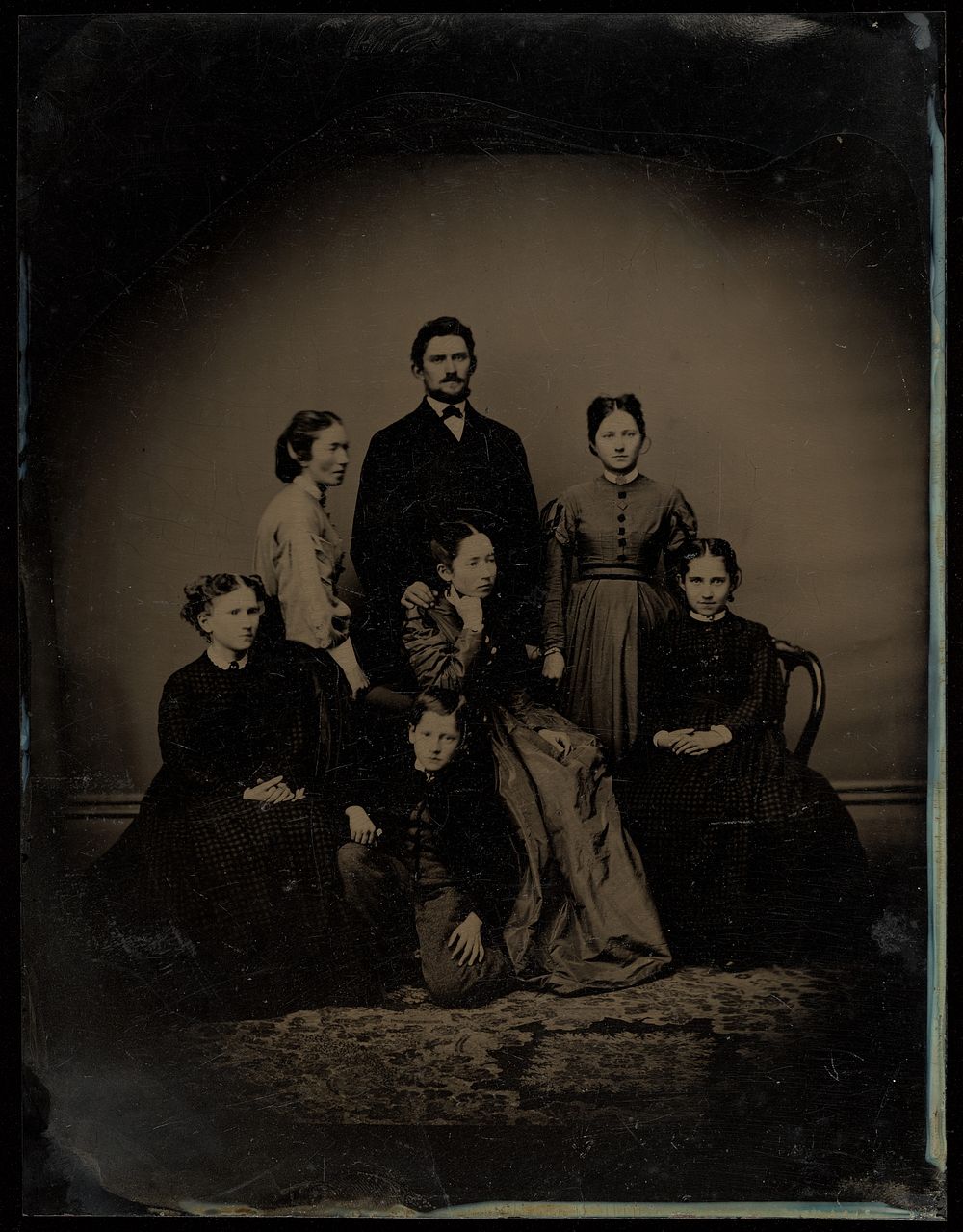 Portrait of an unidentified family of seven members