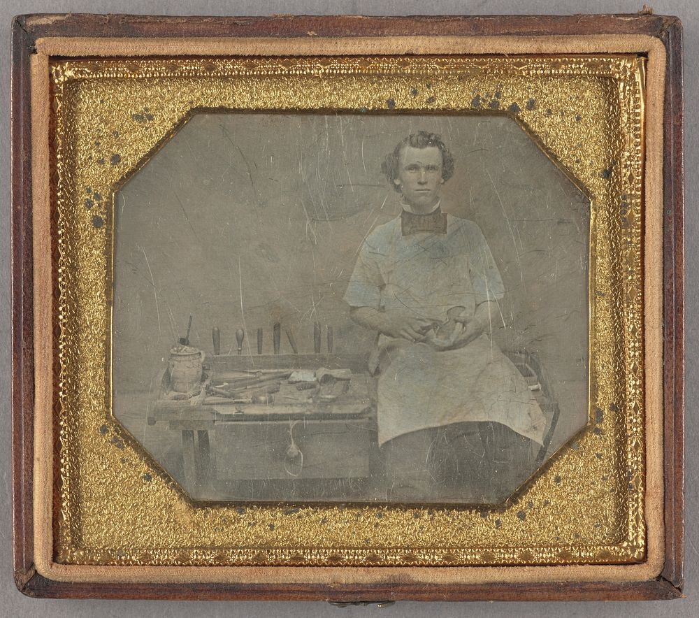Portrait of a Seated Man with Carving Tools