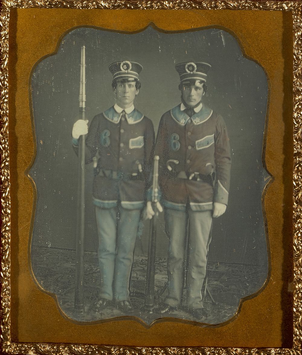 Portrait of Two Young Men in Uniform