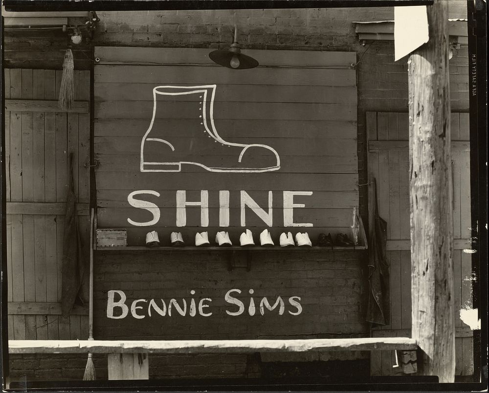 Shoeshine Sign in a Southern Town / Shoeshine Stand Detail, Southeastern U.S. by Walker Evans