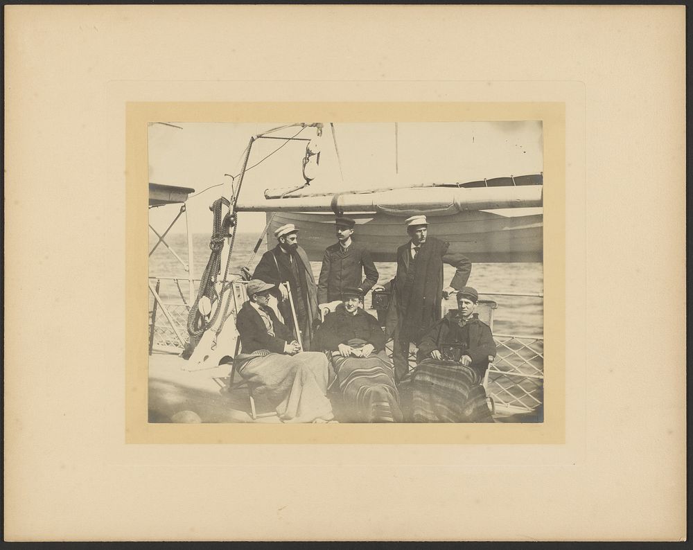 Group portrait of men on boat