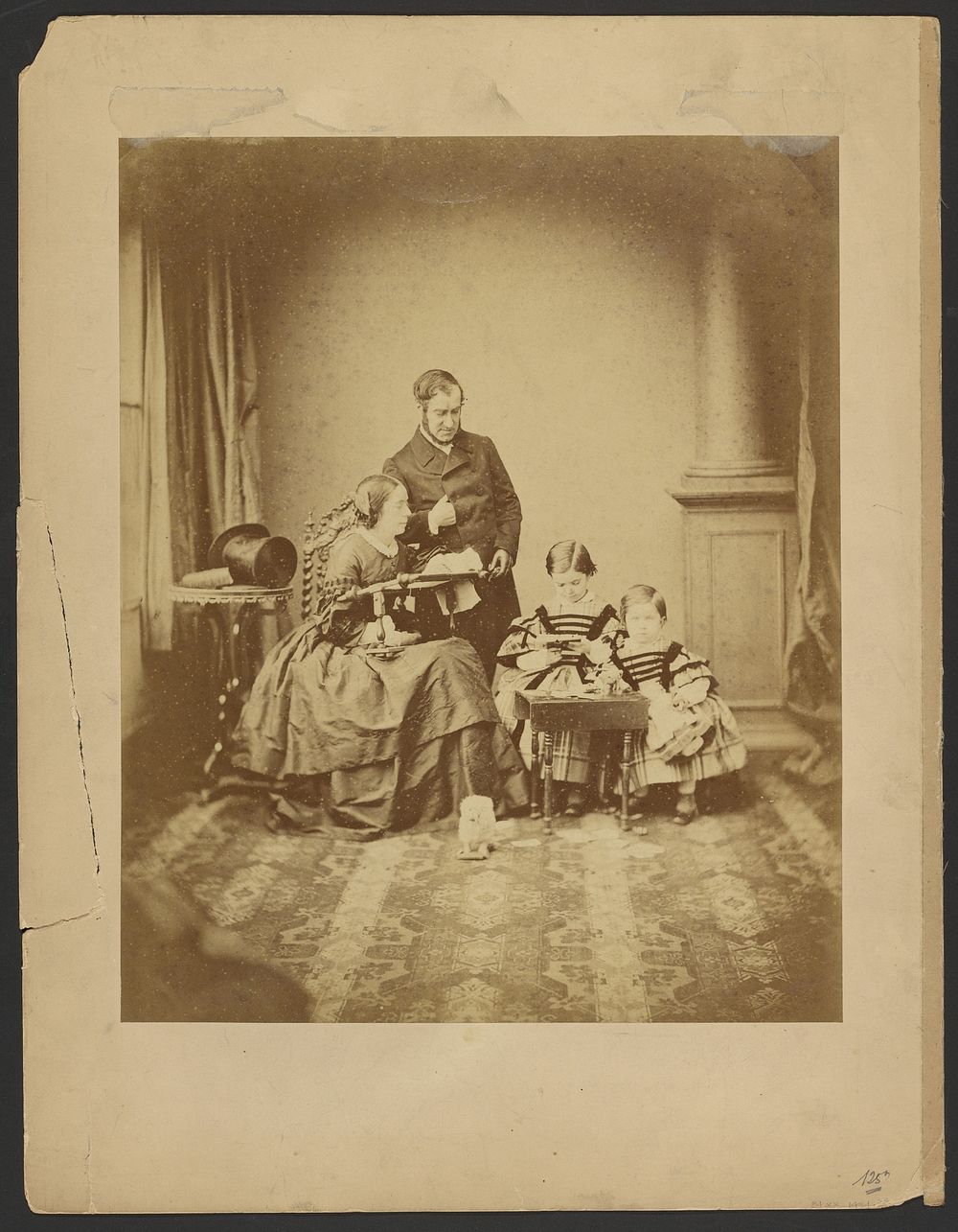 Portrait of man, woman, and children