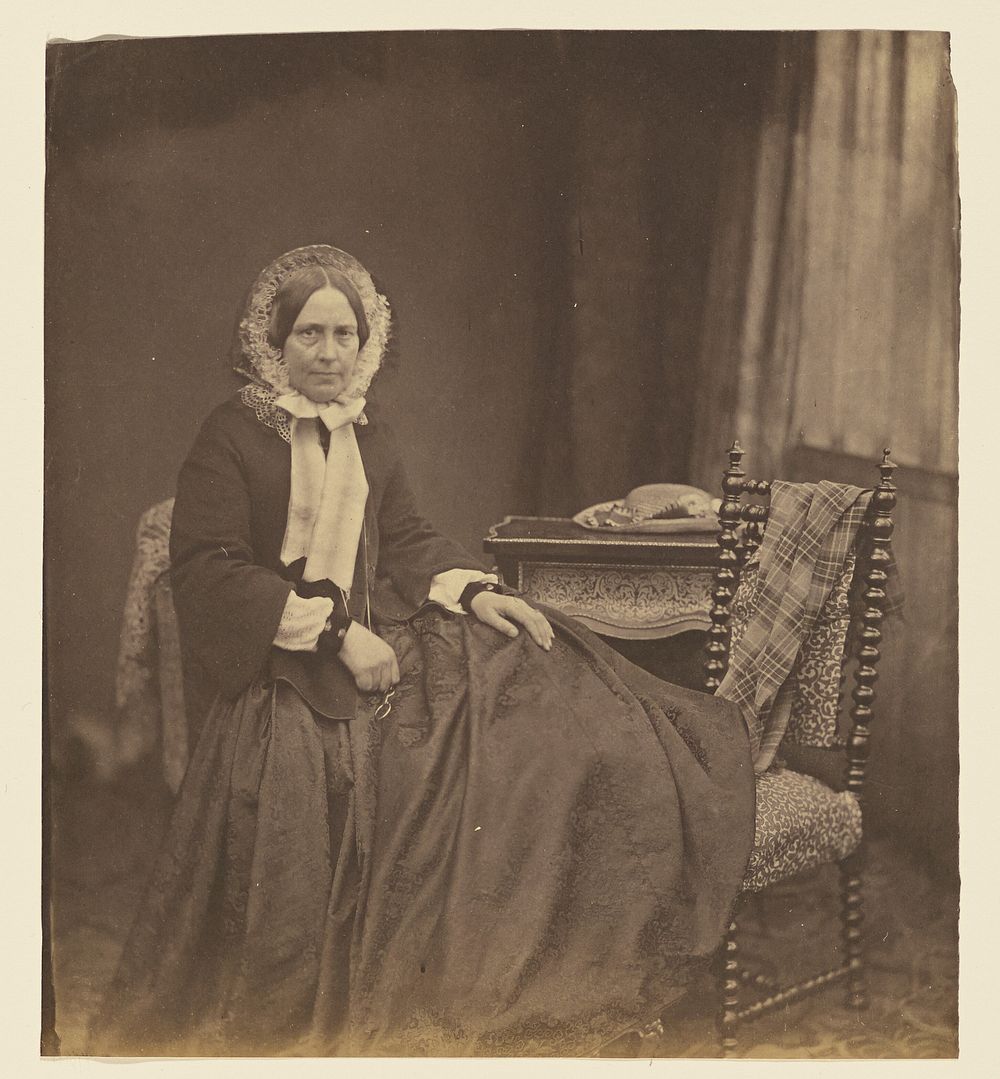 Portrait of a woman, wearing a bonnet, seated by Roger Fenton