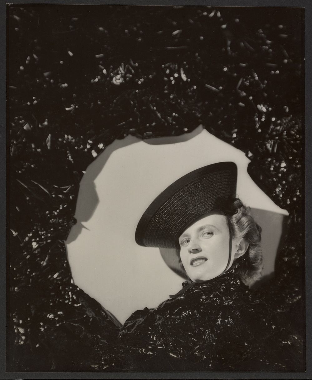 Woman wearing a hat by Günther Krampf