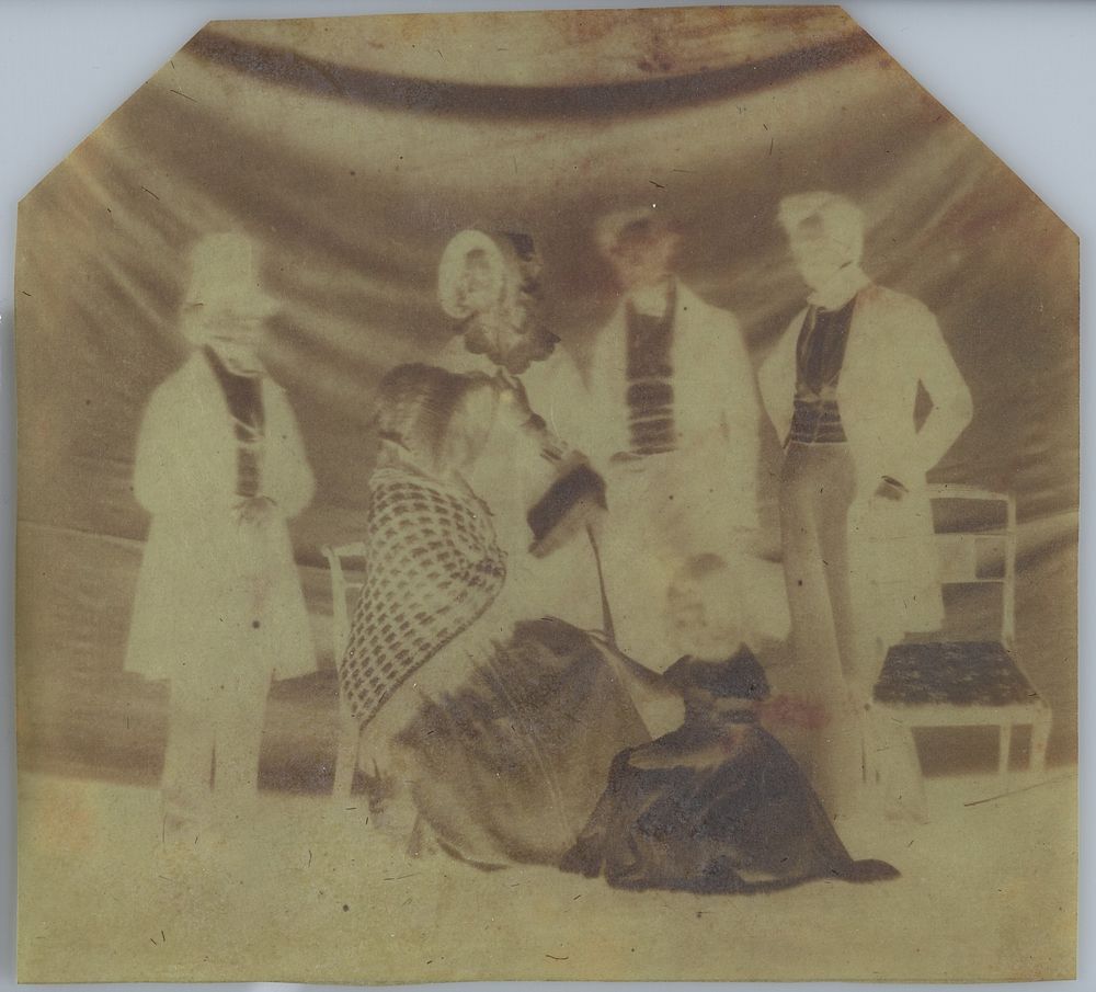 A Group Poses in Front of a Backdrop by William Henry Fox Talbot