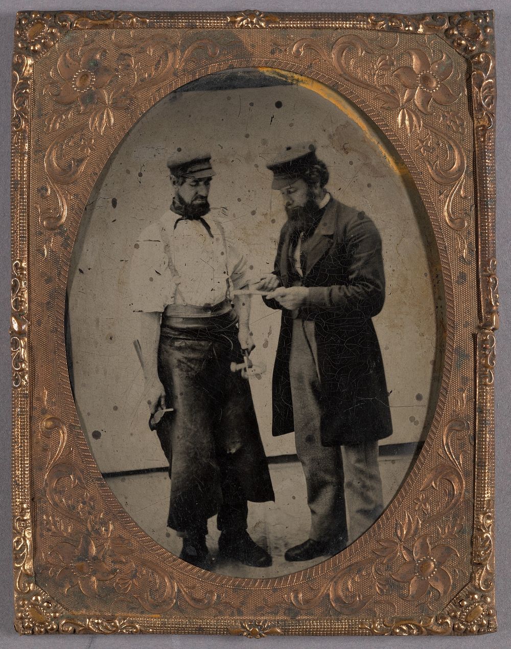 Portrait of Two Bearded Workmen