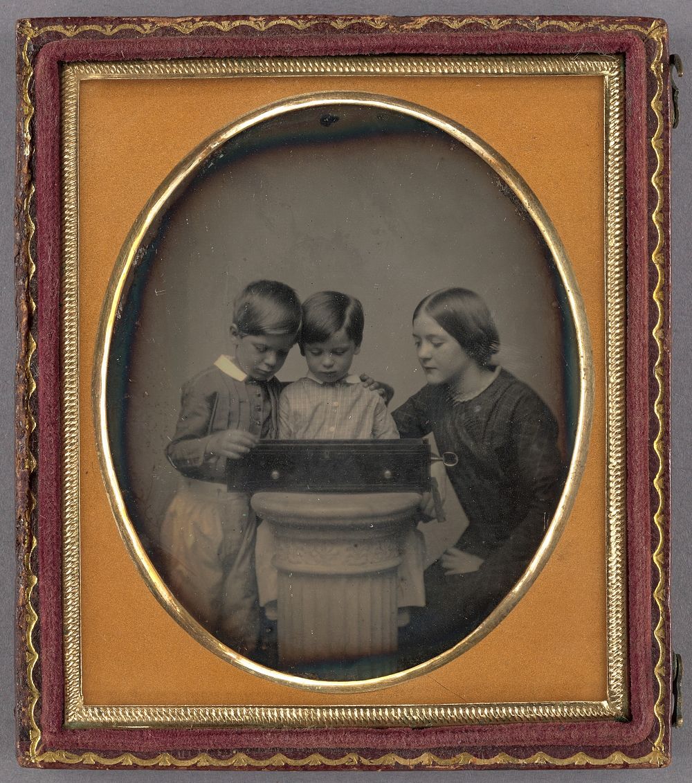 Portrait of Two Children and Their Mother Viewing a Music Box