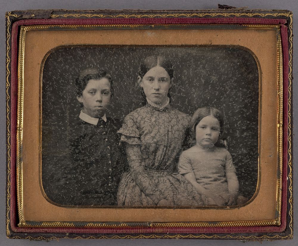 Portrait of Three Seated Children