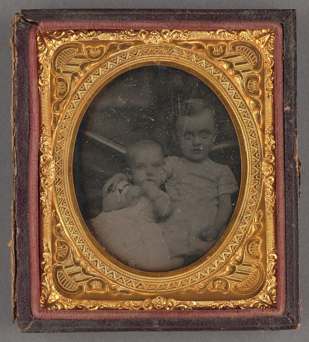 Portrait of Two Seated Children