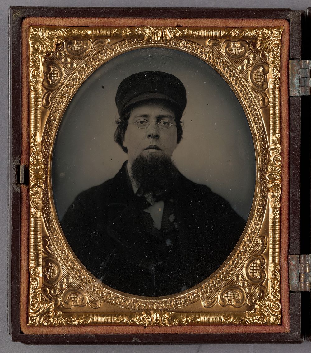 Portrait of a Seated Man Wearing Cap with Thick Chin Whiskers