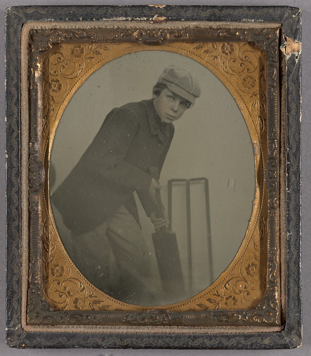 Young Boy with Cricket Bat