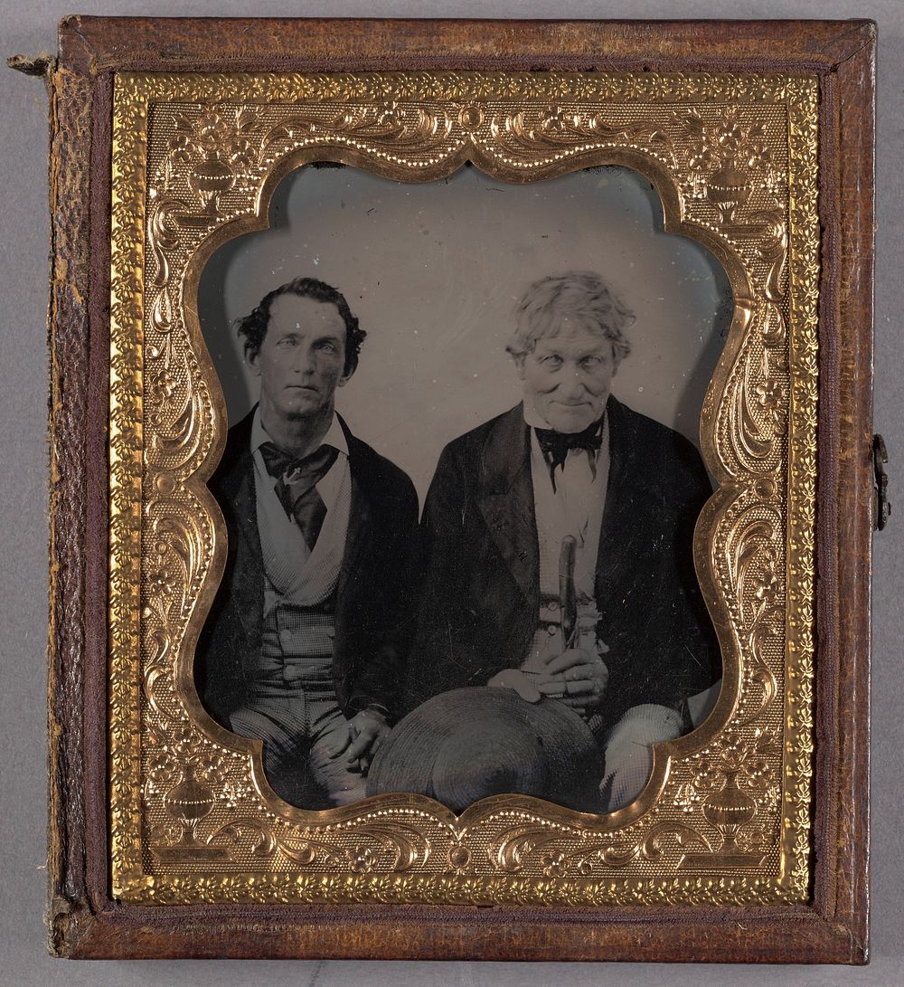 Portrait of Two Seated, Somewhat Dishelved Men