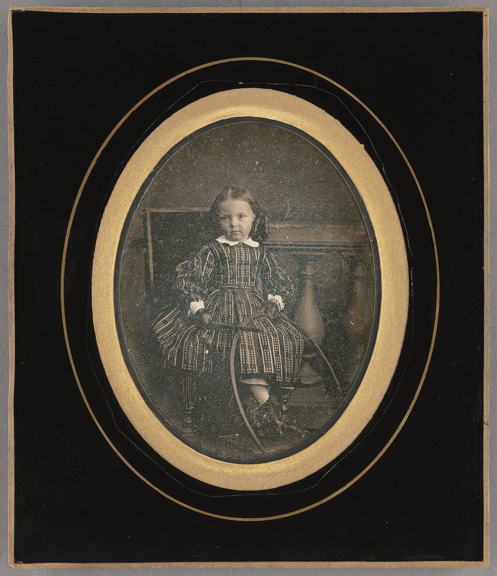 Portrait of a young girl with hoop