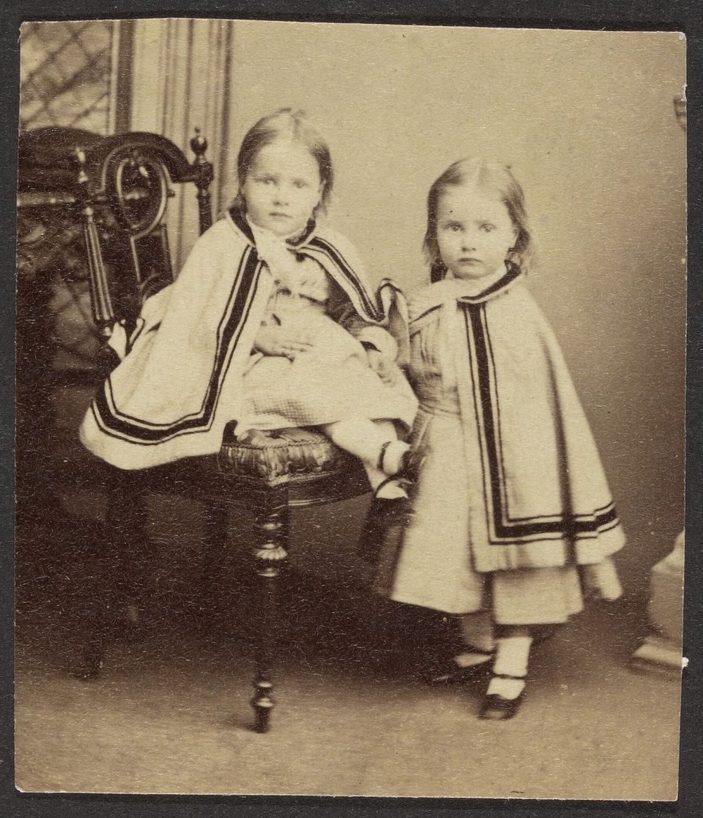 Portrait of Two Girls in Matching Capes
