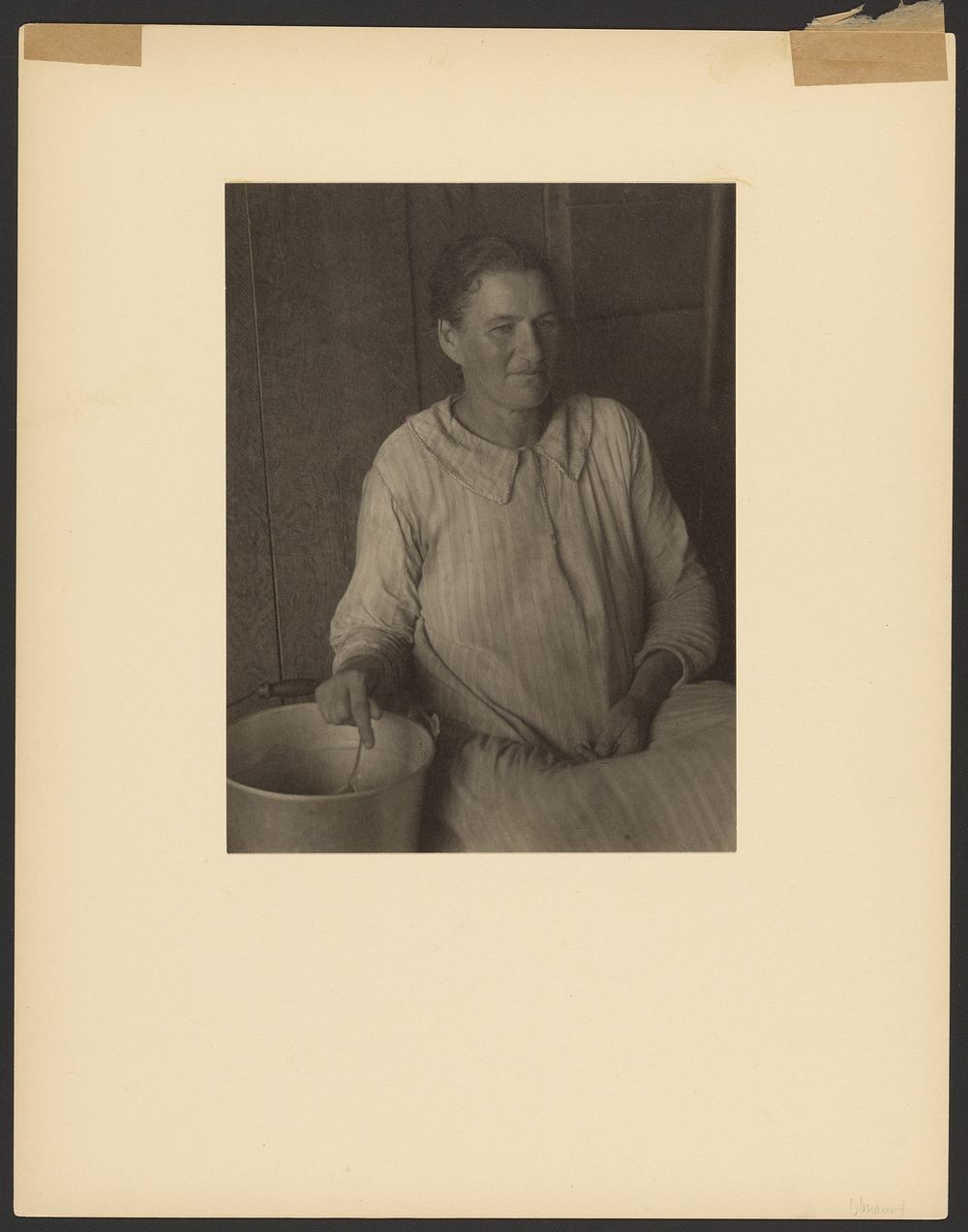 Woman Seated by a Pail by Doris Ulmann