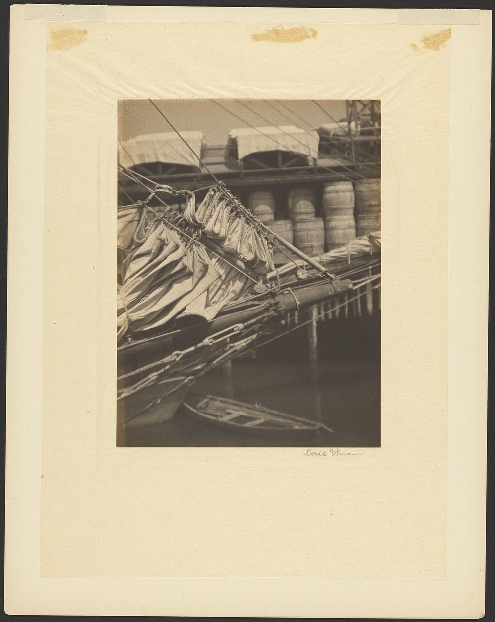 Scene at Dock with Furled Sails and Barrels by Doris Ulmann