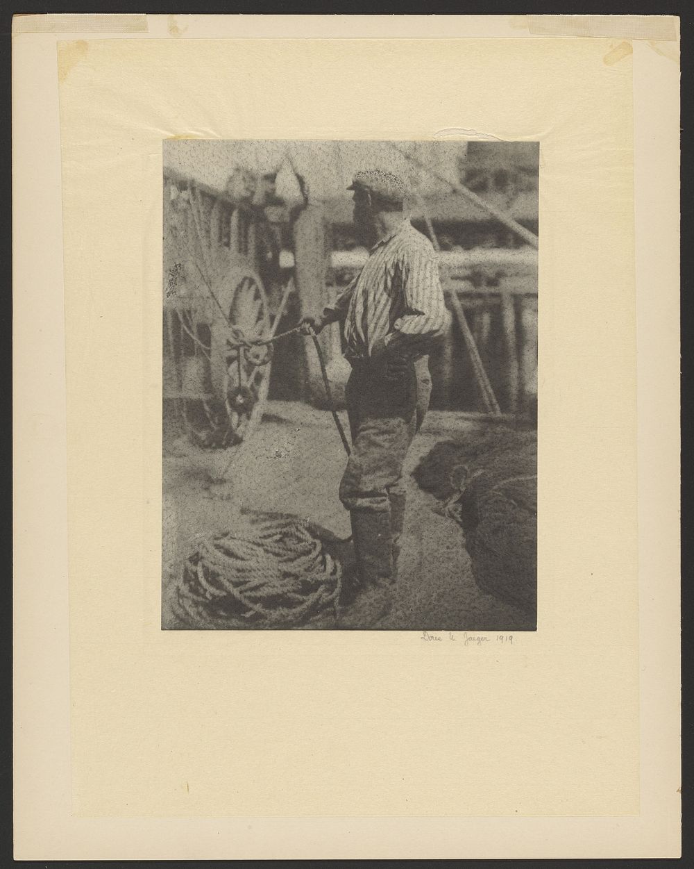 Sailor on Dock Holding Rope by Doris Ulmann