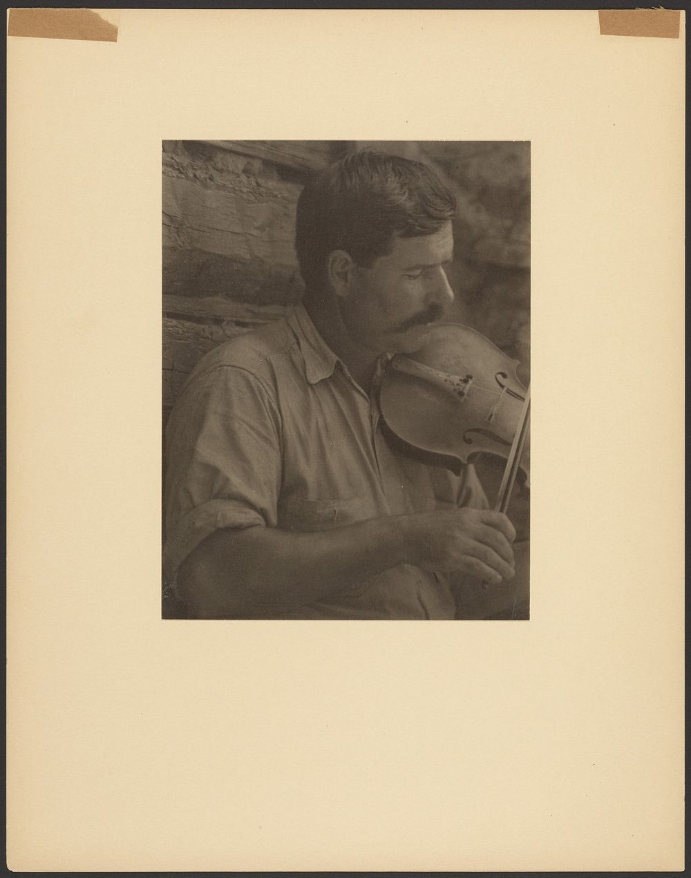 Man Playing the Fiddle by Doris Ulmann