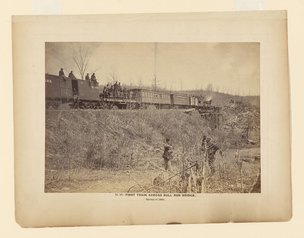 No. 128. First Train Across Bull Run Bridge, Spring of 1863. by A J Russell