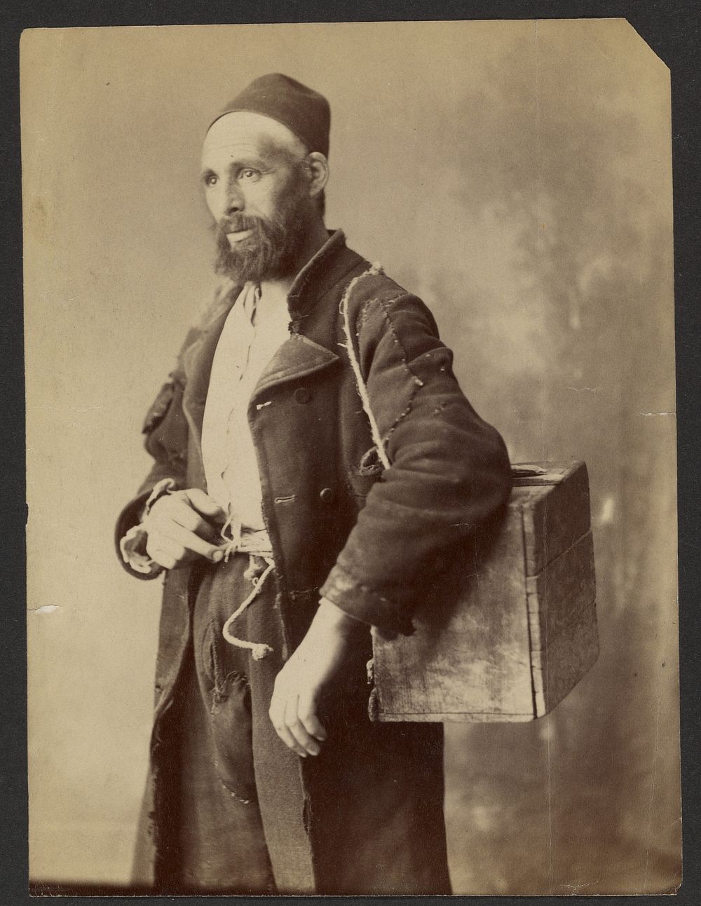 Portrait of man wearing fez