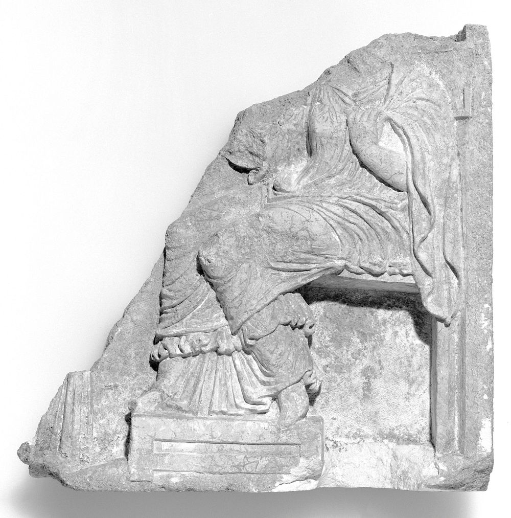 Fragment of a Relief of a Seated Woman, from a Funerary Building