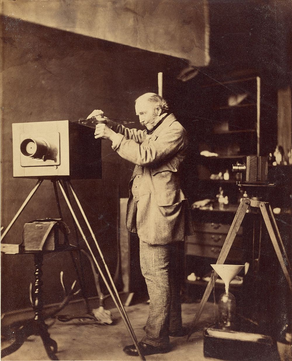 Self-portrait preparing a Collodion plate by Capt Horatio Ross